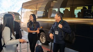 Photo of Guests gathered next to Grand Sierra Resort airport shuttle in Reno, Nevada.