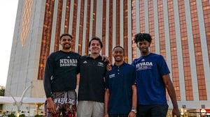 Photo of four players from UNR Men's basketball team at GSR