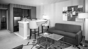 Summit-Executive-Suite-view-of-main-room_grayscale-full_q085_1920x1080